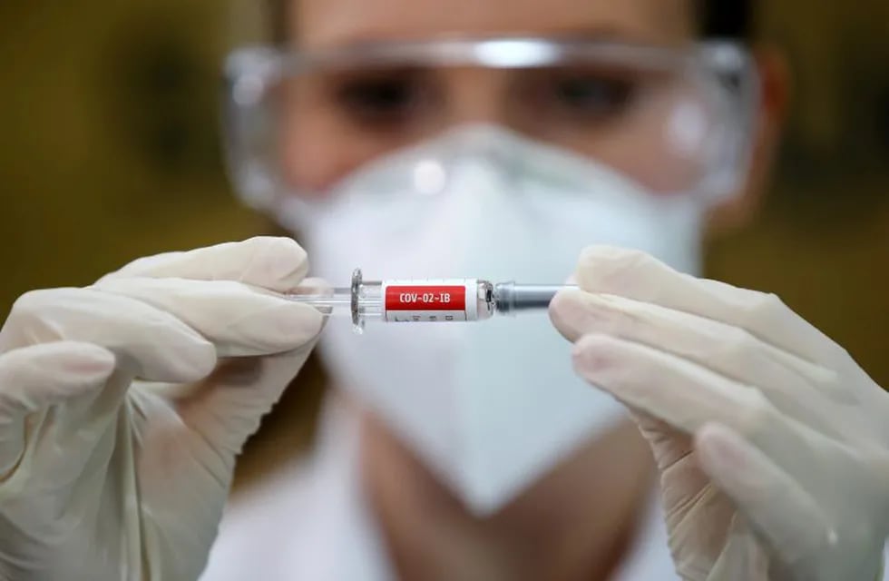 A nurse holds China's Sinovac vaccine, a potential vaccine for the coronavirus disease (COVID-19), at the Sao Lucas Hospital of the Pontifical Catholic University of Rio Grande do Sul (PUCRS), in Porto Alegre, Brazil August 8, 2020. REUTERS/Diego Vara