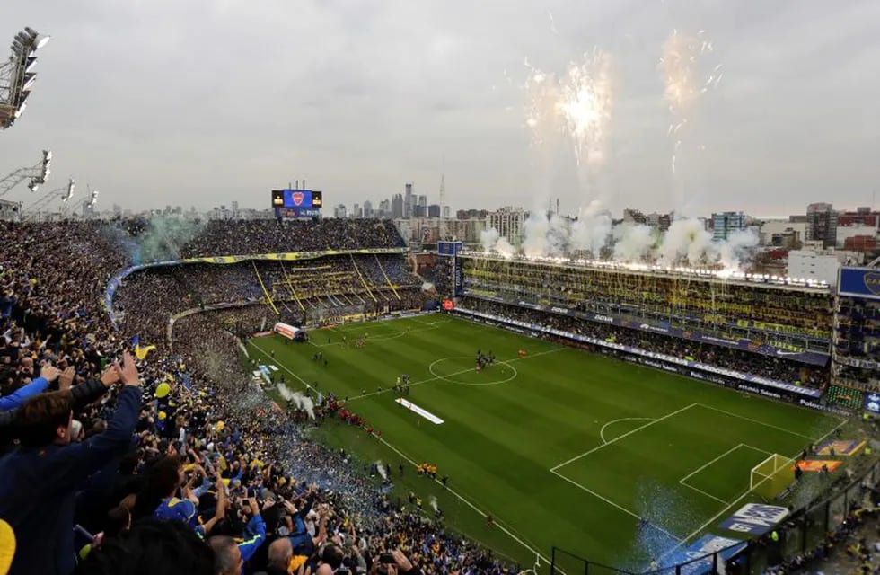 FILE - In this May 14, 2017 file photo, fans get revved as they wait for the start of a national soccer league match between Boca Juniors and River Plate, in Buenos Aires, Argentina. The league kicks off their 2017-18 season Friday, Aug. 25, 2017. (AP Photo/Natacha Pisarenko, File) cancha boca juniors  futbol estadio boca juniors cancha vista vistas futbol estadio vista aerea vistas boca juniors