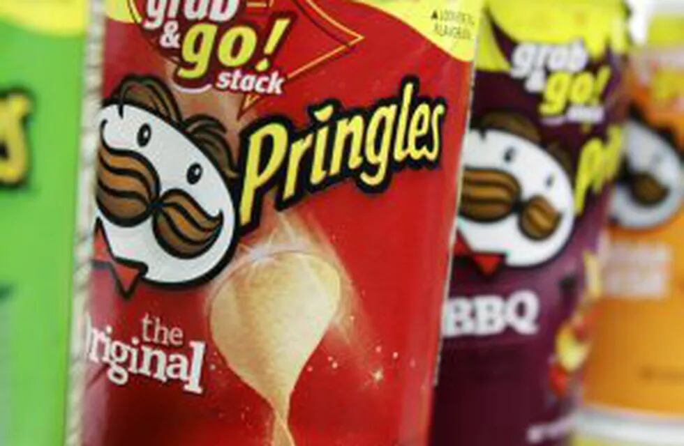 Pringles chips are seen in a posed photo at a West Bath grocery store on Tuesday, April 5, 2011. Diamond Foods Inc. is buying Procter & Gamble Co.'s Pringles chips business in a $1.5 billion deal, the biggest in a string that have given the maker of Pop S