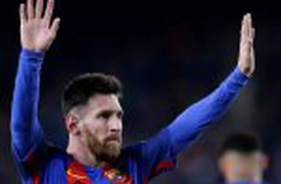 FC Barcelona's Lionel Messi celebrates after scoring during the Spanish La Liga soccer match between FC Barcelona and Espanyol at the Camp Nou in Barcelona, Spain, Sunday, Dec. 18, 2016. (AP Photo/Manu Fernandez)