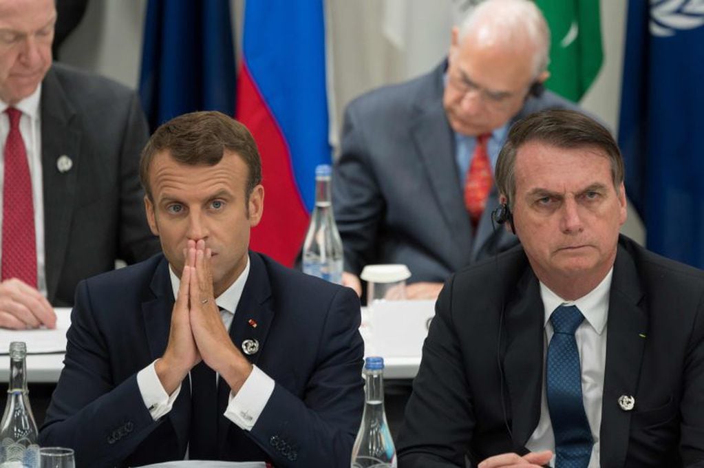 Emmanuel Macron y Jair Bolsonaro en agosto, durante la cumbre del G20 en Japón. Crédito: Jacques Witt / POOL / AFP.