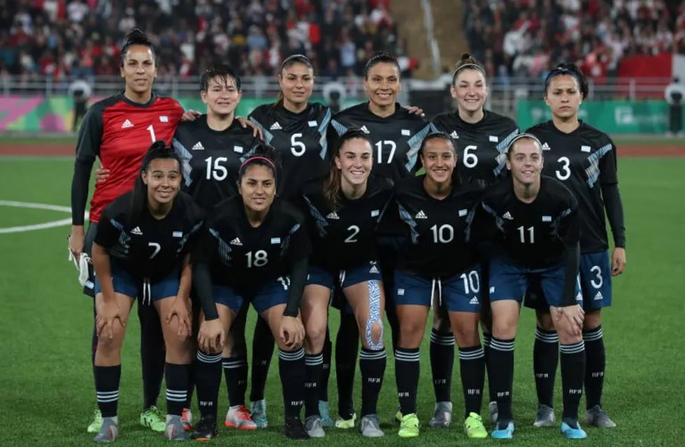 Soccer Football - XVIII Pan American Games - Lima 2019 - Women First Round Group B - Argentina v Peru - San Marcos Stadium, Lima, Peru - July 28, 2019. The squad from Argentina poses before the game. REUTERS/Henry Romero