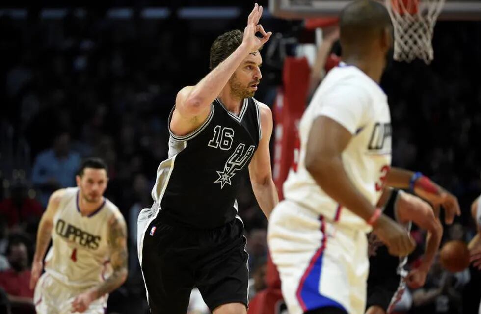 Feb 24, 2017; Los Angeles, CA, USA; San Antonio Spurs center Pau Gasol (16) reacts after making a three-point shot against the LA Clippers during the second quarter at Staples Center. Mandatory Credit: Kelvin Kuo-USA TODAY Sports