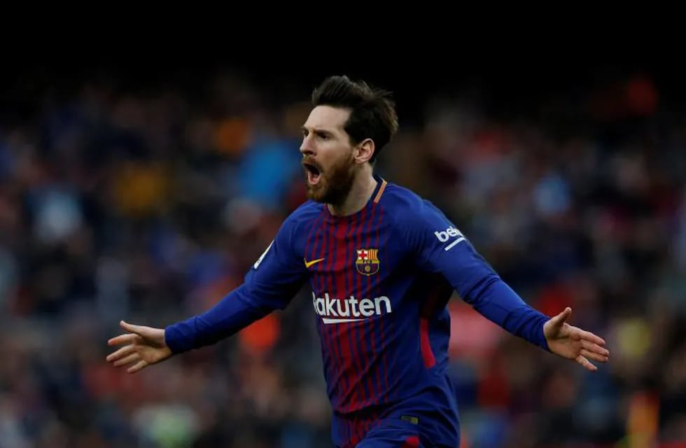 FC Barcelona's Lionel Messi reacts after scoring during the Spanish La Liga soccer match between FC Barcelona and Atletico Madrid at the Camp Nou stadium in Barcelona, Spain, Sunday, March 4, 2018. (AP Photo/Manu Fernandez)
