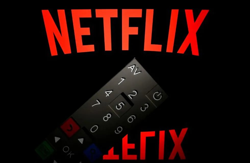 (FILES)This illustration picture taken on April 21, 2018 in Paris shows the logo of the Netflix entertainment company, displayed on a tablet screen with a remote control in front of it. - Netflix unveiled plans January 15, 2019 to boost prices for US subscribers, a move that helped lift shares of the streaming television giant which now faces an array of new competitors.The California-based company, which has nearly half of its 130 million paid members in the US, will raise the price of its most popular streaming plan with high-definition video by 18 percent to $12.99 per month. (Photo by Lionel BONAVENTURE / AFP)