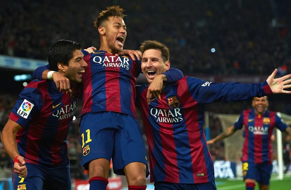 FILE - In this Sunday, Jan. 11, 2015 file photo, FC Barcelona's Lionel Messi, right, Neymar, center, and Luis Suarez, celebrate after scoring against Atletico Madrid during a Spanish La Liga soccer match at the Camp Nou stadium in Barcelona, Spain. Barcelona said, Wednesday, Aug. 2, 2017, Neymar's 222 million euro ($262 million) release clause must be paid in full if the Brazil striker wants to leave. (AP Photo/Siu Wu, File)