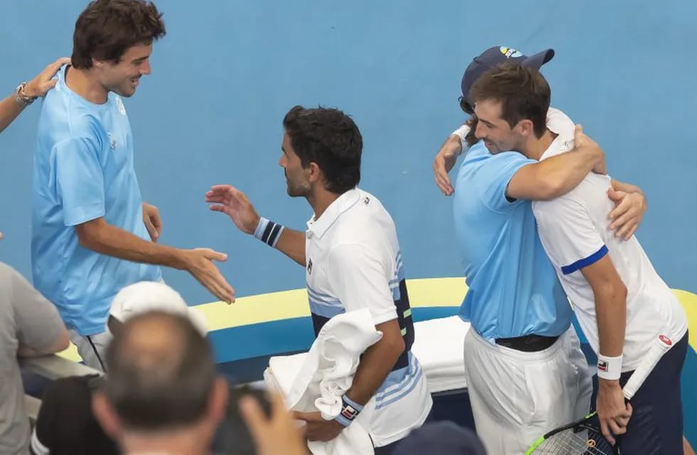 Sydney (Australia), 04/01/2020.- Maximo Gonzalez and Andres Molteni (R) of Argentina celebrate their victory in the doubles match between Poland and Argentina on day two of the ATP Cup tennis tournament at Ken Rosewall Arena in Sydney, Australia, 04 January 2020. (Tenis, Polonia) EFE/EPA/CRAIG GOLDING EDITORIAL USE ONLY AUSTRALIA AND NEW ZEALAND OUT