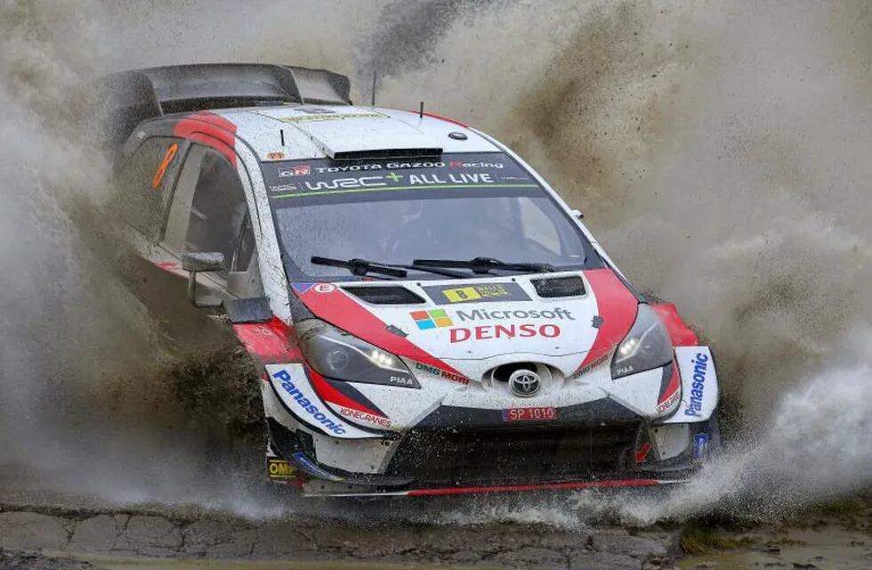 Estonian pilot Ott Tanak and co pilot Martin Jarveoja  drive their Toyota Yaris WRC as they compete in the Sweet Lamb stage of the Wales Rally GB, the 12th round of the FIA World Rally Championship, in north west Wales on October 5, 2019. (Photo by GEOFF CADDICK / AFP)