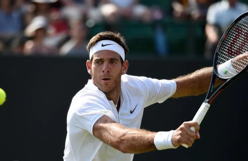 Argentina's Juan Martin del Potro returns against Latvia's Ernests Gulbis during their men's singles second round match on the fourth day of the 2017 Wimbledon Championships at The All England Lawn Tennis Club in Wimbledon, southwest London, on July 6, 2017.\r\nGulbis won the match 6-4, 6-4, 7-6. / AFP PHOTO / Oli SCARFF / RESTRICTED TO EDITORIAL USE inglaterra londres Juan Martin del Potro tenis torneo de wimbledon tenistas
