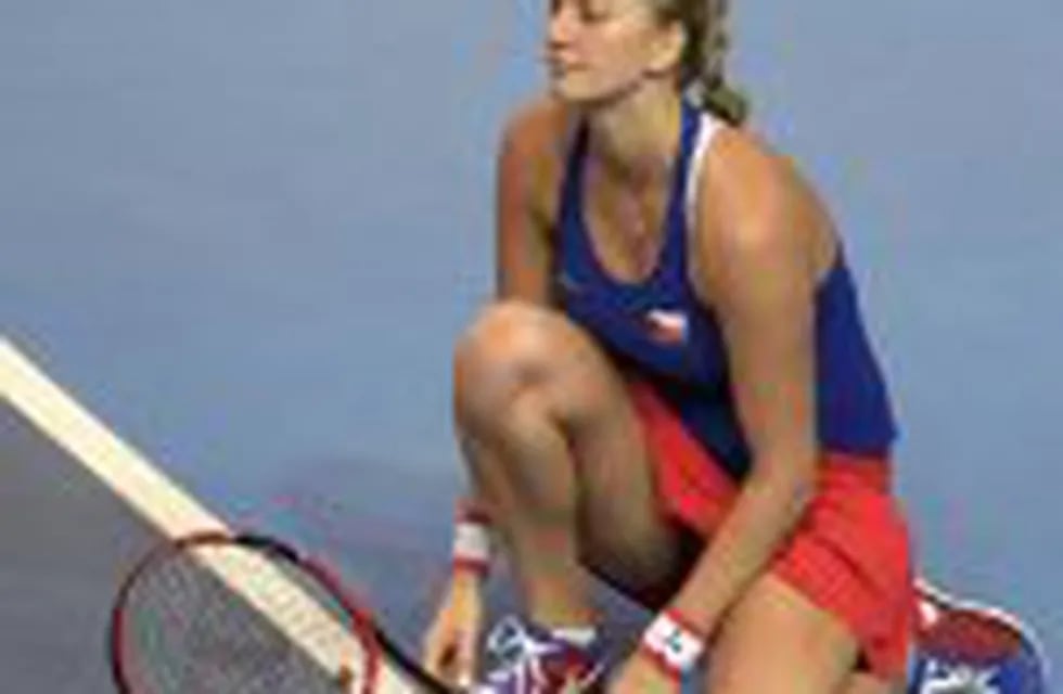 (FILES) This file photo taken on November 12, 2016 shows Czech Republic's Petra Kvitova reacting after being defeated by France's Caroline Garcia in Strasbourg, eastern France, during the Fed Cup final tennis match between France and Czech Republic.nTwo-t