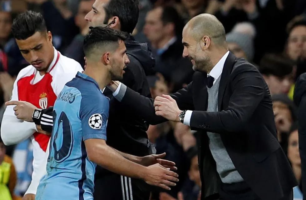 Britain Football Soccer - Manchester City v AS Monaco - UEFA Champions League Round of 16 First Leg - Etihad Stadium, Manchester, England - 21/2/17 Manchester City's Sergio Aguero with Manchester City manager Pep Guardiola after being substituted Action I