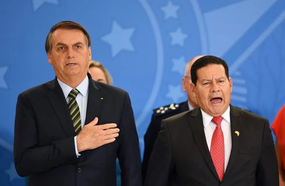 Jair Bolsonaro y Hamilton Mourao. (Foto: EVARISTO SA / AFP)