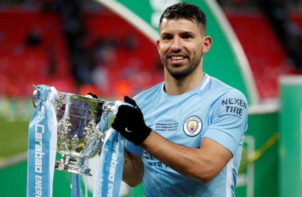 Soccer Football - Carabao Cup Final - Arsenal vs Manchester City - Wembley Stadium, London, Britain - February 25, 2018   Manchester City's Sergio Aguero celebrates with the trophy after winning the Carabao Cup   Action Images via Reuters/Peter Cziborra     EDITORIAL USE ONLY. No use with unauthorized audio, video, data, fixture lists, club/league logos or \