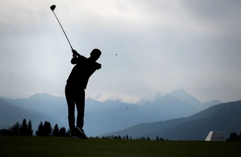 TOPSHOT - Northern Ireland's Rory McIlroy plays a shot during a pro-am tournament ahead of the PGA European Tour golf tournament Omega European Masters on August 28, 2019 in Crans-Montana. (Photo by FABRICE COFFRINI / AFP)