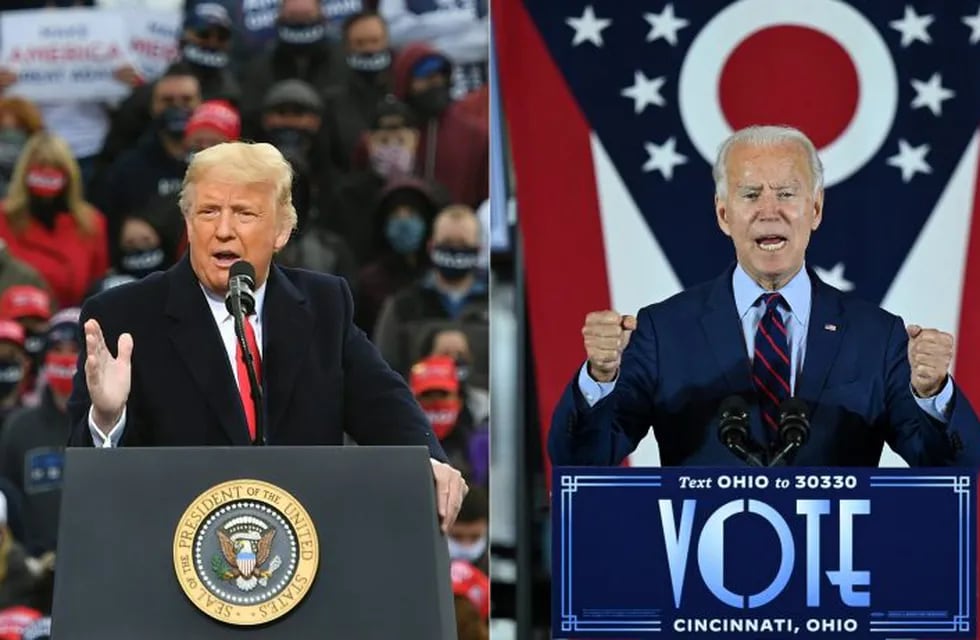 (COMBO) This combination of pictures created on October 30, 2020 shows\nUS President Donald Trump speaks during a campaign rally at Manchester-Boston Regional Airport in Londonderry, New Hampshire on October 25, 2020.\nDemocratic Presidential candidate and former Vice President Joe Biden delivers remarks at a voter mobilization event in Cincinnati, Ohio, on October 12, 2020, where he will speak to the importance of Ohioans making their voices heard this election. (Photos by MANDEL NGAN and JIM WATSON / AFP)