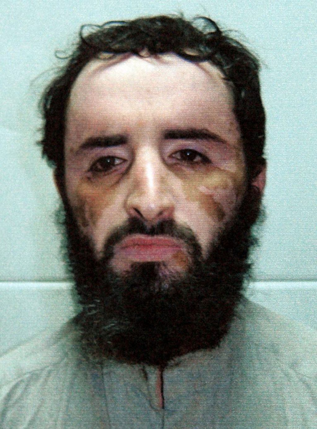 FILE - This file photo released by Pakistan's Interior Ministry shows senior al-Qaida leader Abu Faraj al-Libi on May 4, 2005, in Islamabad, Pakistan.  To his CIA interrogators in a secret prison in Iraq Al-Libi, a Libyan who had become al-Qaida's operational commander after Khalid Sheikh Mohammed's capture, adamantly denied knowing one of al-Qaida's most important couriers, Abu Ahmed al-Kuwaiti. Suspecting a lie, and an important one, the CIA reasoned that if they could find al-Kuwaiti, they could find bin Laden. And years later al-Kuwaiti did unwittingly lead the agency to Osama bin Laden's doorstep in Pakistan. (AP Photo/Pakistan Interior Ministry, HO, File) pakistan islamabad Abu Faraj al Libi lider red terrorista al qaeda terrorismo terroristas