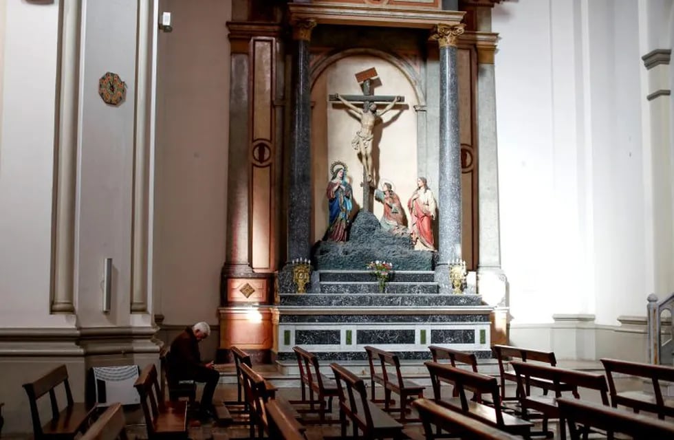 A man prays inside the Sacred Heart Catholic church in Mendoza, Argentina, Saturday, Aug. 3, 2019. In 2017, the Vatican sent two Argentine priests to Mendoza province to investigate allegations of sexual abuse by Roman Catholic priests at the Antonio Próvolo School for Deaf and Hearing Impaired Children. Dante Simon, a judicial vicar, told the Associated Press that the acts denounced are \