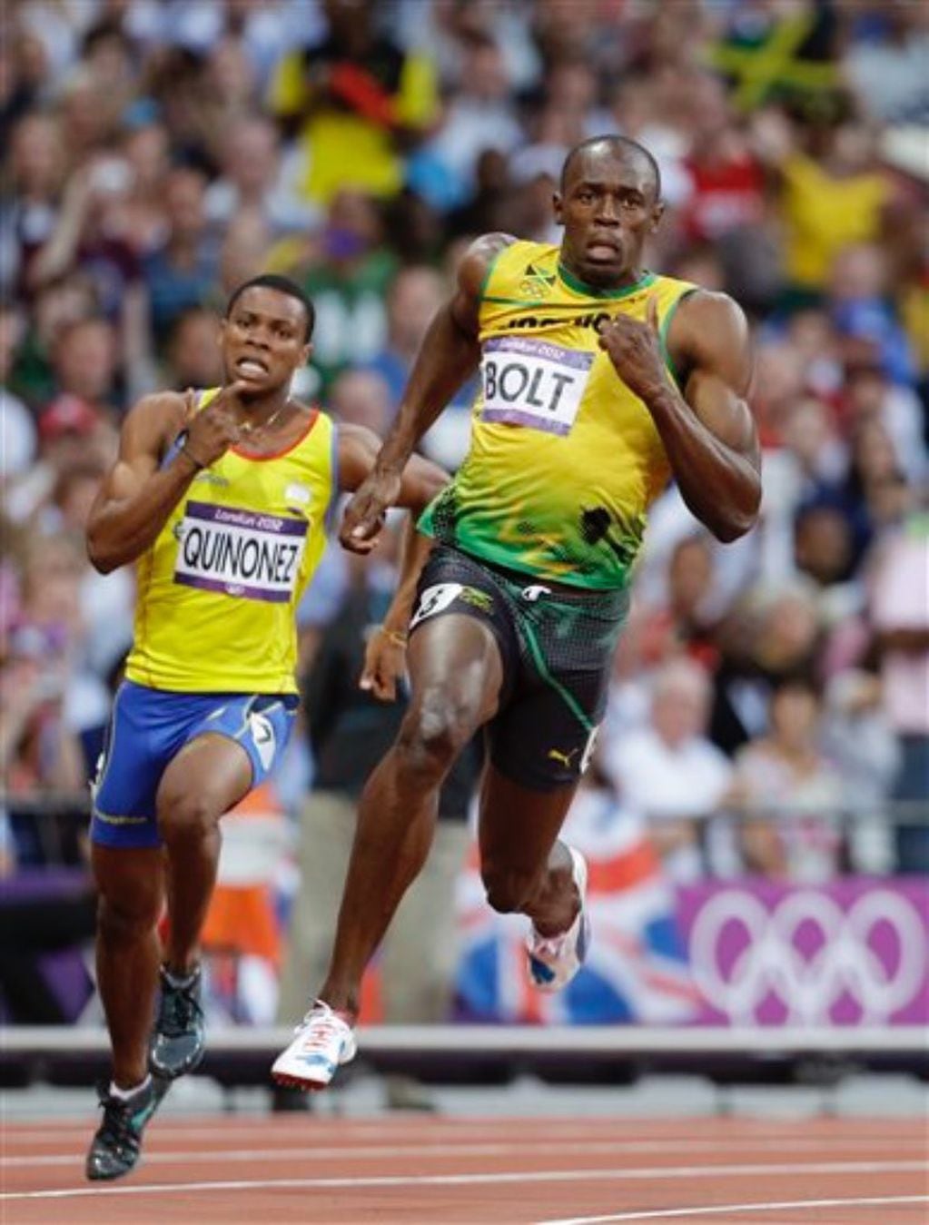 Alex Quiñónez compitiendo con Usain Bolt