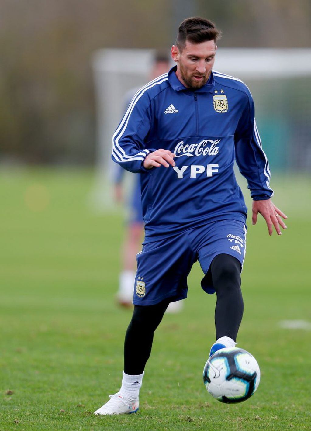Argentina's player Lionel Messi dribbles the ball during a training session in Buenos Aires, Argentina, Thursday, May 30, 2019, ahead of the Copa America in neighboring Brazil. (AP Photo/Natacha Pisarenko)