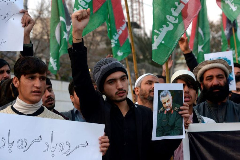 Protesters shout slogans against the United States during a demonstration following a US airstrike that killed top Iranian commander Qasem Soleimani in Iraq, in Peshawar on January 3, 2020. - A US strike killed top Iranian commander Qasem Soleimani at Baghdad's international airport On January 3, dramatically heightening regional tensions and prompting arch enemy Tehran to vow "revenge". (Photo by Abdul MAJEED / AFP)