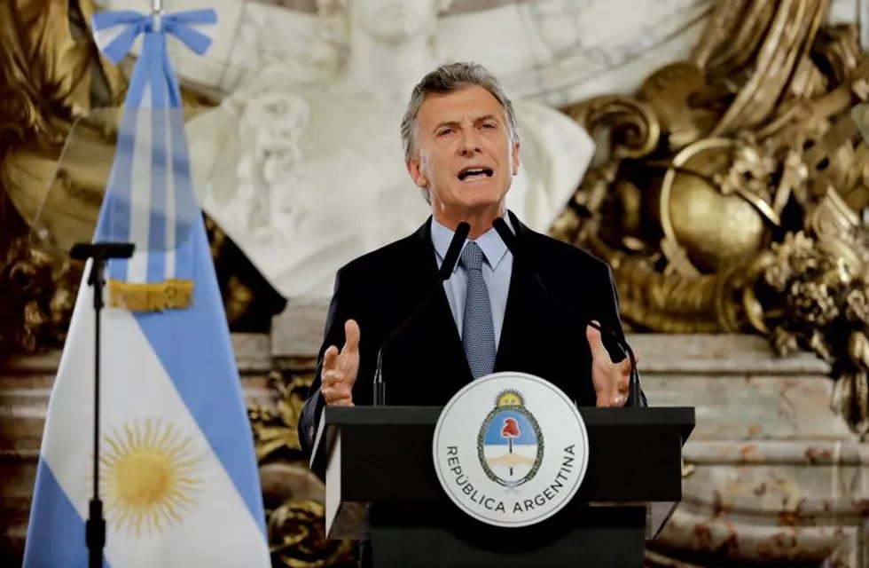 Argentina's President Mauricio Macri announces a presidential decree that aims to expedite the recovery of property related to corruption and drug trafficking, at the government house in Buenos Aires, Argentina, Monday, Jan. 21, 2019. (AP Photo/Natacha Pisarenko)