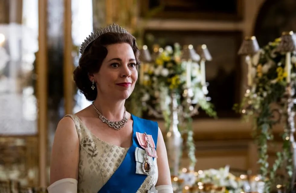 In this image released by Netflix, Olivia Colman portrays Queen Elizabeth II in a scene from \