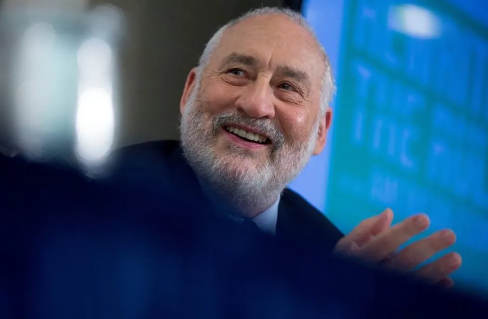 Joseph Stiglitz, Nobel prize-winning economist and professor of economics at Columbia University,, smiles while speaking during a panel session at a Roosevelt Institute event at the National Press Club in Washington, D.C., U.S., on Tuesday, May 12, 2015. Stiglitz, the Nobel Prize-winning economist who popularized the term \