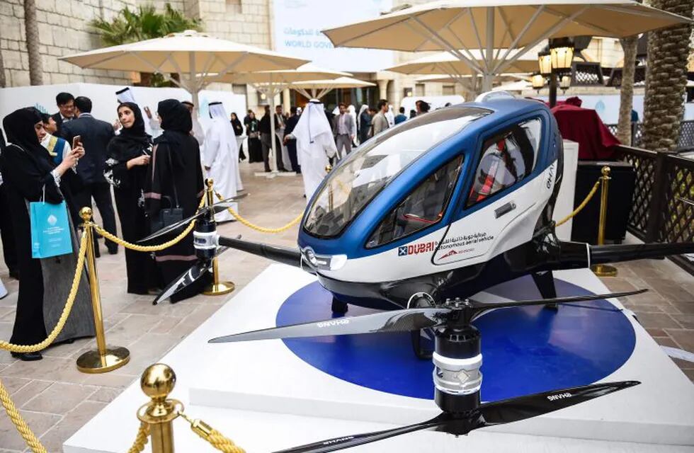 A model of the EHang 184 autonomous aerial vehicle is displayed at the World Government Summit 2017 in Dubai's Madinat Jumeirah on February 13, 2017. / AFP PHOTO / STRINGER Dubai  drones taxis EHang 184