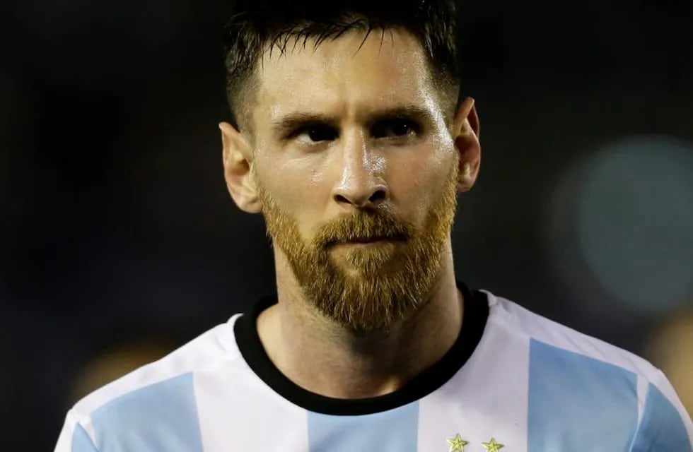 In this March 23, 2017 Argentina's Lionel Messi leaves the pitch at the end of a World Cup qualifying match against Chile in Buenos Aires, Argentina. Messi has been banned from Argentina's next four World Cup qualifiers, starting with the Tuesday, March 2