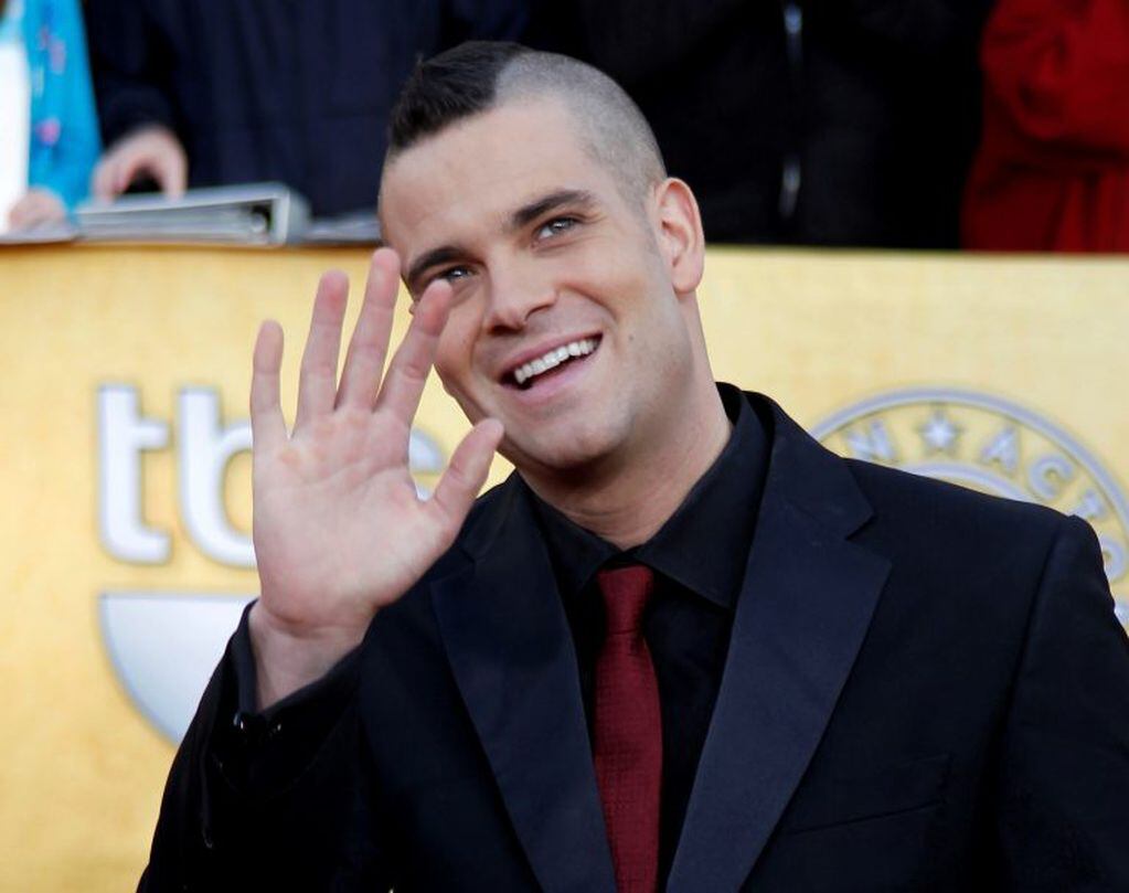 FILE PHOTO: Actor Mark Salling from the TV show "Glee" arrives at the 17th annual Screen Actors Guild Awards in Los Angeles, California, U.S. January 30, 2011.  REUTERS/Lucy Nicholson/File Photo
