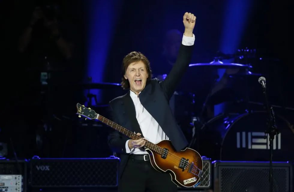 (FILES) This file photo taken on June 11, 2015 shows British musician and former Beatles' member Paul McCartney performs at the Stade de France in Saint-Denis near Paris.  The Rolling Stones, Bob Dylan, Paul McCartney, Neil Young, Roger Waters and The Who will perform at a mega festival in October, organizers said May 3, 2016. The iconic artists have been confirmed for the October 7-9 concert at the Empire Polo field in Indio, in the California desert, an event being billed by music lovers as one of the greatest concerts ever.\r\nThat same venue hosts the annual Coachella music festival.\r\n / AFP / PATRICK KOVARIK\r\n francia saint denis Paul McCartney recital en el stade de france musica recitales