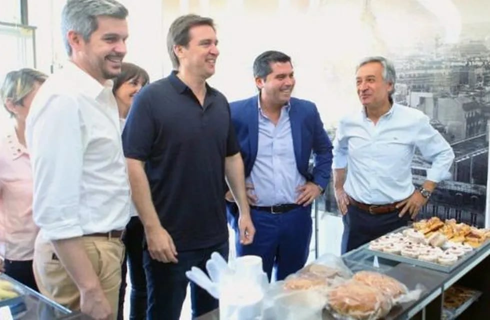 Marcos Peña con Eduardo Cáceres, Marcelo Orrego y Roberto Basualdo.