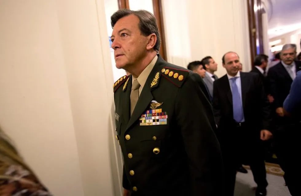 FILE - In this March 1, 2015 file photo, Gen. Cesar Milani arrives to Congress for the inauguration ceremony of the 2015 legislative year in Buenos Aires, Argentina. “On Friday August 9, 2019, a court in the Argentine province of La Rioja found Milani not guilty of the crimes of kidnapping and torture during the 1976-1983 for which he was sent to trial”. (AP Photo/Rodrigo Abd, File)