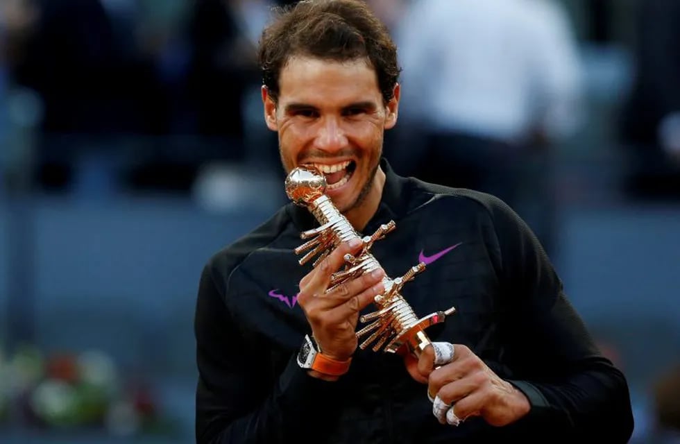 Tennis - ATP 1000 Masters - Madrid Open - Men's Singles Final - Dominic Thiem of Austria v Rafael Nadal of Spain - Madrid, Spain - 14/5/17 - Nadal poses with the trophy after his victory. REUTERS/Susana Vera