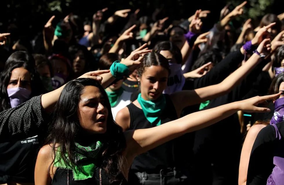 Students perform 'El violador eres tú' (The rapist, is you) -a song by Chilean Lastesis which became viral worldwide following their country's social protests- during a demonstration against gender violence and patriarchy at the Jesuit University of Guadalajara (ITESO), as part of the start of activities for 8M \