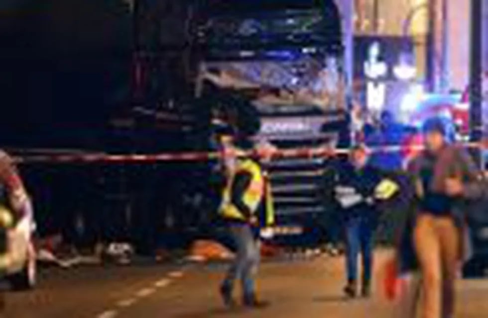 Police work at the site of an accident at a Christmas market on Breitscheidplatz square near the fashionable Kurfuerstendamm avenue in the west of Berlin, Germany, December 19, 2016. A truck ploughed into a crowd close to a Christmas market in the German 