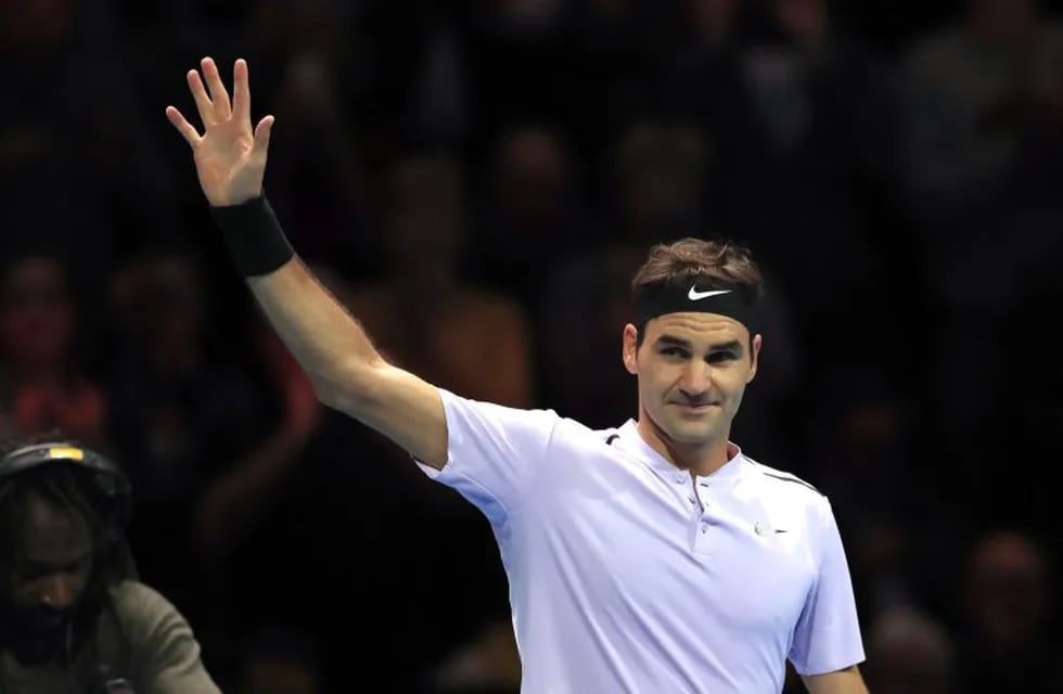 El suizo Roger Federer festeja el triunfo ante el croata Marin Cilic el en el Masters de tenis de Londres. (DPA)
