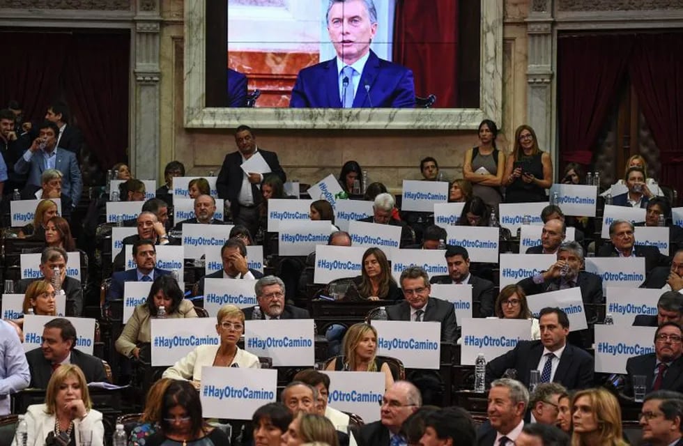 Handout photo released by the Argentinian Senate Press Office showing opposition legislators benches with banners reading \