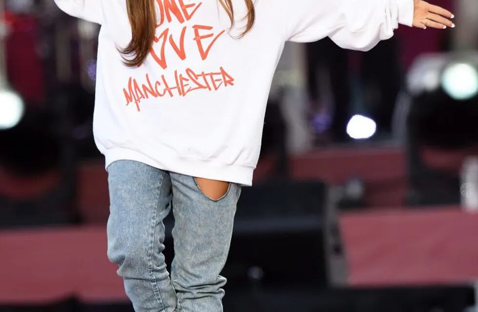 In this photograph released by One Love Manchester on June 4, 2017, US musician Ariana Grande performs at the One Love Manchester benefit concert for the families of the victims of the May 22, Manchester terror attack, at Emirates Old Trafford in Greater Manchester on June 4, 2017.  / AFP PHOTO / One Love Manchester / Dave Hogan for One Love Manchester / RESTRICTED TO EDITORIAL USE - MANDATORY CREDIT \