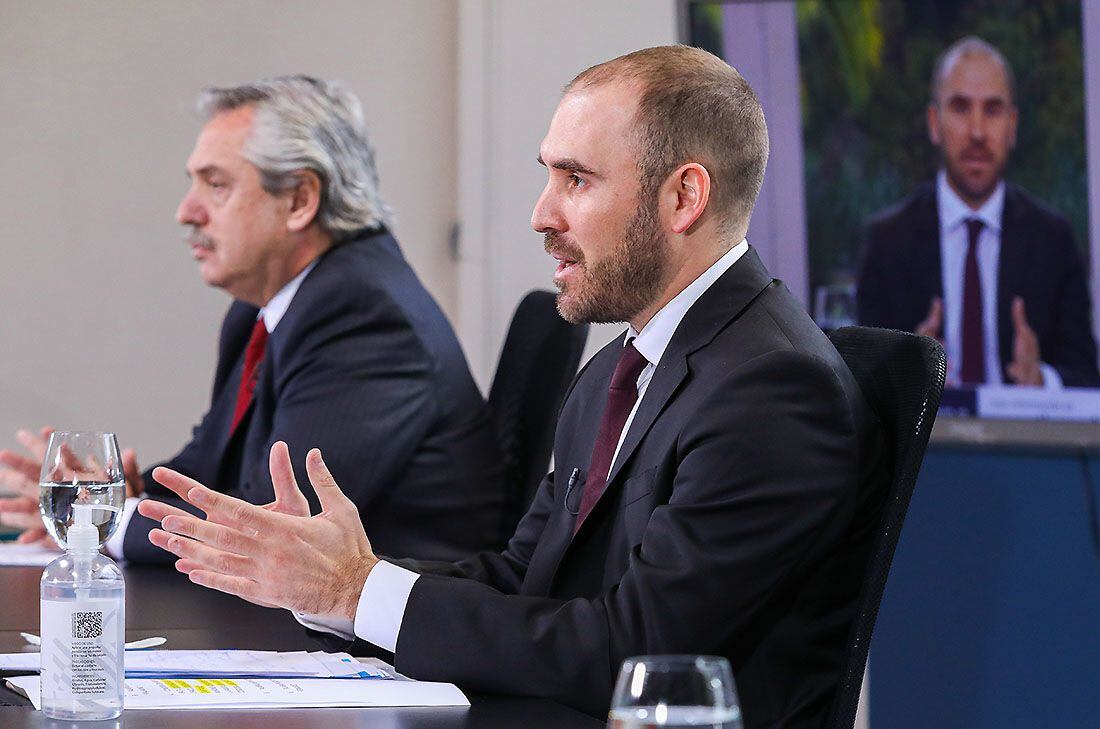 Martín Guzmán, ministros de Economía, junto a Alberto Fernández. 