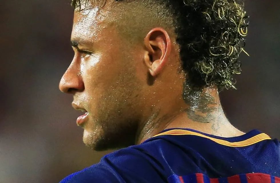 MIAMI GARDENS, FL - JULY 29: Neymar #11 of Barcelona reacts in the first half against Real Madrid during their International Champions Cup 2017 match at Hard Rock Stadium on July 29, 2017 in Miami Gardens, Florida.   Chris Trotman/Getty Images/AFP\n== FOR NEWSPAPERS, INTERNET, TELCOS & TELEVISION USE ONLY ==