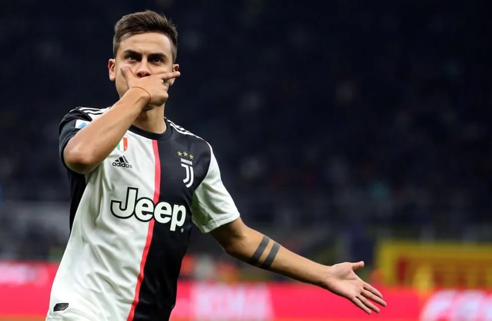 Milan (Italy).- (FILE) - Juventus' Paulo Dybala jubilates after scoring the 0-1 goal during the Italian serie A soccer match between FC Inter and Juventus FC at Giuseppe Meazza stadium in Milan, Italy, 6 October 2019 (re-issued on 06 May 2020). On 06 May 2020 Juventus FC announced that Paulo Dybala 'performed, as per protocol, a double check with diagnostic tests (swabs) for Coronavirus-Covid 19, which came back with negative results. The player has, therefore, recovered and will no longer be subjected to the home isolation regime'. (Italia) EFE/EPA/MATTEO BAZZI *** Local Caption *** 55528853