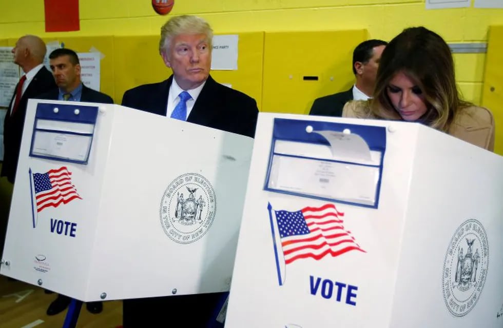 Republican presidential nominee Donald Trump and his wife Melania Trump vote at PS 59 in New York, New York, U.S. November 8,  2016.   REUTERS/Carlo Allegri