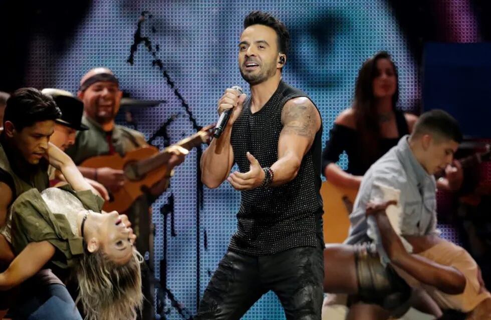 In this April 27, 2017 file photo, Luis Fonsi performs during the Latin Billboard Awards in Coral Gables, Fla. The Puerto Rican singer-songwriter feels blessed that his global success came at a point in his life where he's mature and grounded enough to simply enjoy it without losing touch with reality. (AP Photo/Lynne Sladky, File)