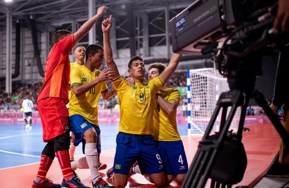 Guilherme Henrique Borges Sanches BRA celebrates with team mates in the Semi-Final match against Argentina ARG of the Futsal Mens Tournament at the Futsal Main Stadium, Tecnopolis Park. The Youth Olympic Games, Buenos Aires, Argentina, Monday 15th October 2018.  Lukas Schulze for OIS/IOC/Handout via REUTERS ATTENTION EDITORS - THIS IMAGE HAS BEEN SUPPLIED BY A THIRD PARTY.