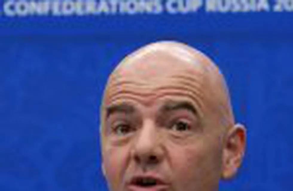 FILE- In this Saturday, Nov. 26, 2016 file photo, FIFA President Gianni Infantino speaks during a news briefing ahead of the draw for the soccer Confederations Cup 2017, in Kazan, Russia. Infantino has suggested having 16 three-team groups if the World Cu
