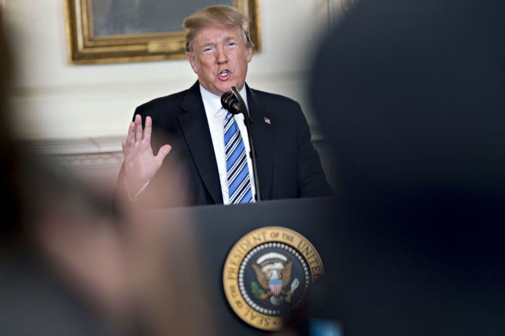 U.S. President Donald Trump speaks during a press conference about the Parkland, Florida high school shooting in the Diplomatic Room of the White House in Washington, D.C., U.S., on Thursday, Feb. 15, 2018. An orphaned 19-year-old with a troubled past and his own AR-15 rifle was charged with 17 counts of premeditated murder this morning following the deadliest school shooting in the U.S. in five years that occurred yesterday. Photographer: Andrew Harrer/Bloomberg