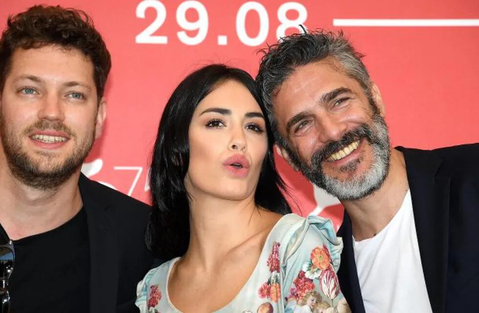 Argentinian filmmaker Gonzalo Tobal, Argentinian actors  Lali Esposito and Leonardo Sbaraglia pose during a photocall for 'Acusada' during the 75th annual Venice International Film Festival, in Venice, Italy.