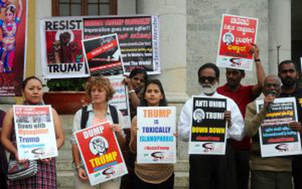 Bangalore (India), 21/01/2020.- Members of New Socialist Alternative Indian section of the committee for the workers international fighting for Democratic Socialism holds placards and shouts slogans against the newly sworn United States of American Presid