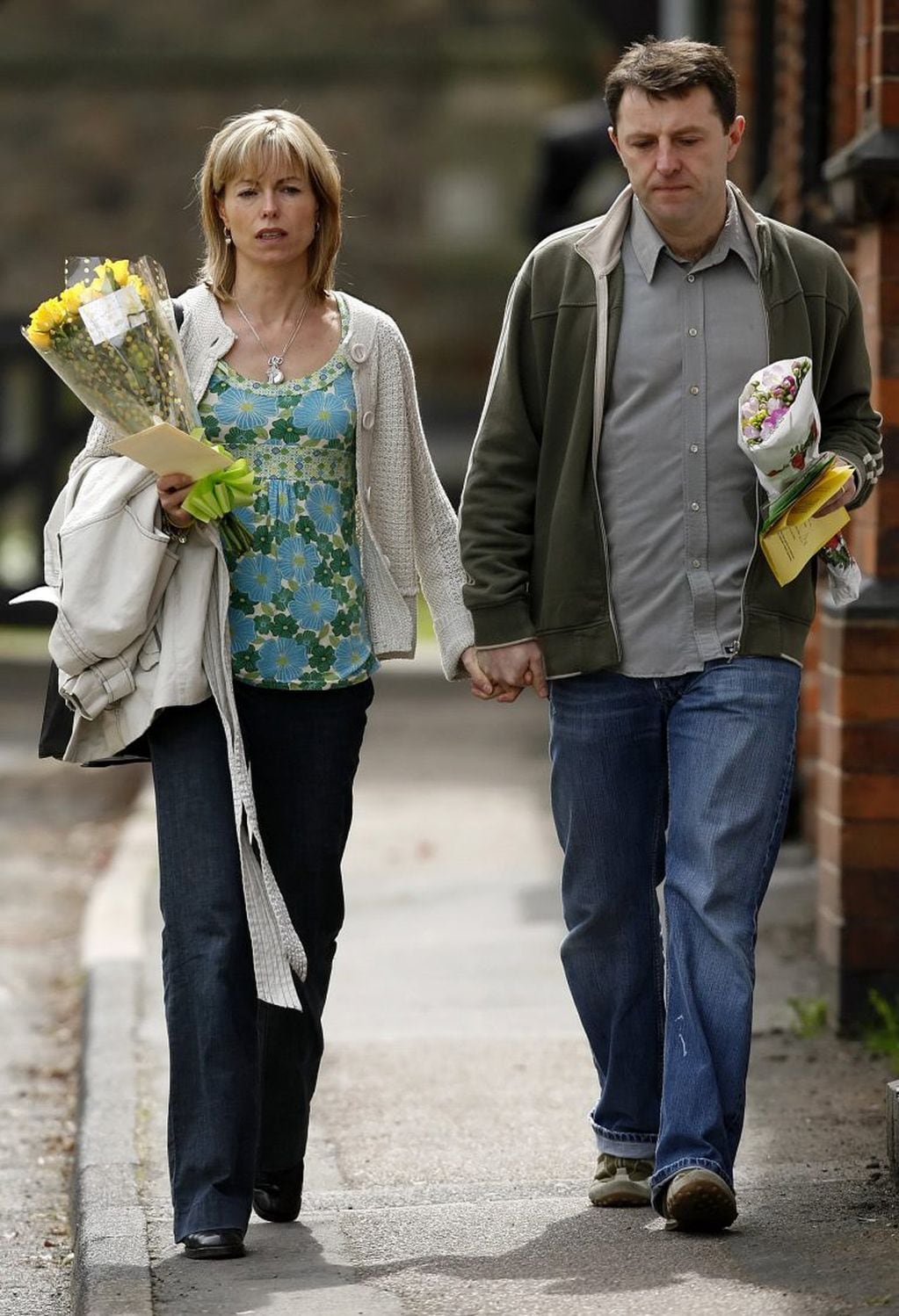 PORTUGAL-BRITAIN-MISSING-COURT-MCCANNS, - (FILES) Kate and Gerry McCann leave St Mary and St John Parish Church in the village of Rothley, Leicestershire, following a church service on the day of the first anniversary since the disappearance of their daug